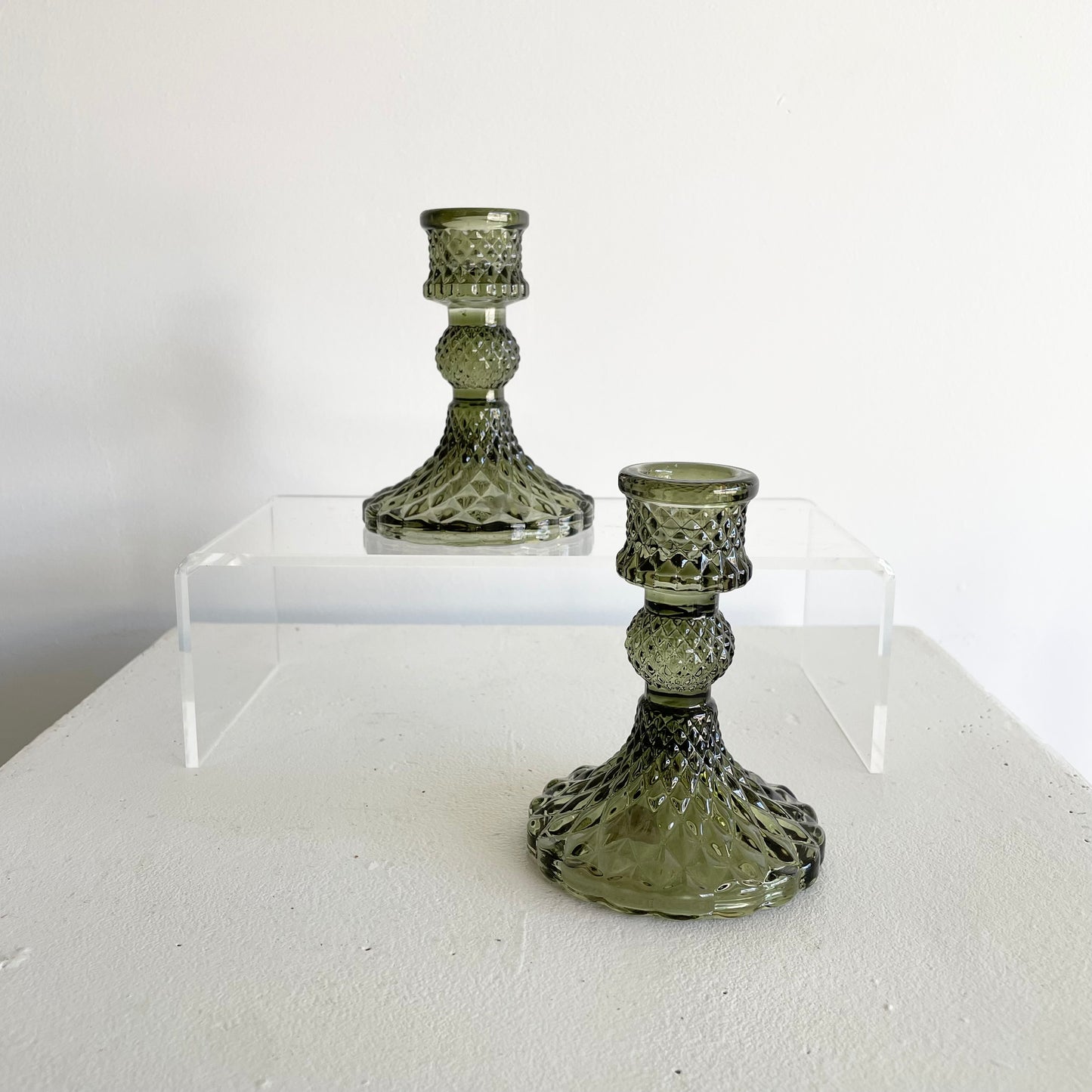 Green glass taper candle holder